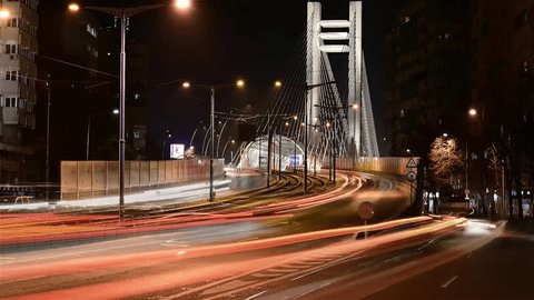 Large Steel Bridge in The City of Bucharest. Bridge Steel Support Cables That Hang on a High Concrete Structures.