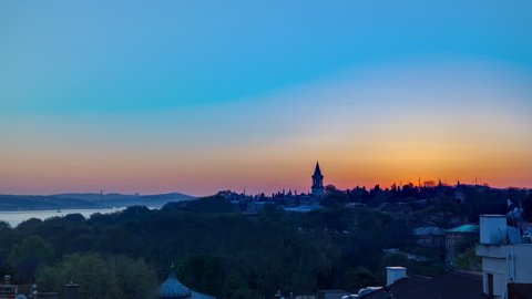Beautiful Sunrise at the Istanbul from top with Bosphorus Bridge and Topkapi Palace Museum timelapse - Istanbul - Turkey. Aerial view from sultanahmet downtown at clear spring day