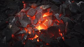 Red hot. glowing charcoal shards made from coconut shells. ready for cooking in Sri Lanka. South Asia. 1920x1080 stock footage