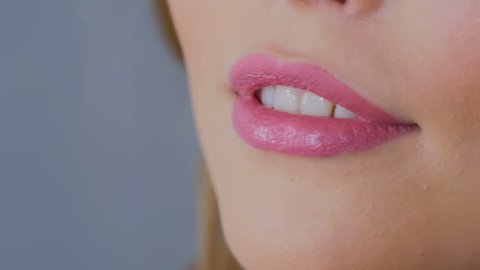 Close up shot of woman's lips. Beauty, fashion and make up concept