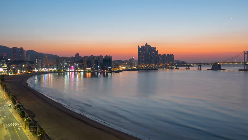 Sunrise view of Busan, South Korea. Gwangan bridge and city center. Time lapse