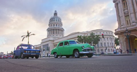 traffic and El Capitolio building In Havana, Cuba