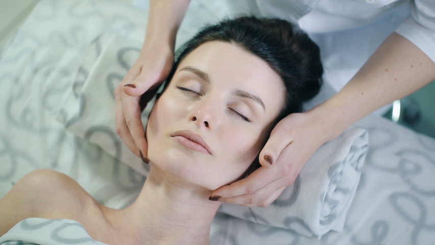 Massage of a woman's face | Shutterstock HD Video #26410142