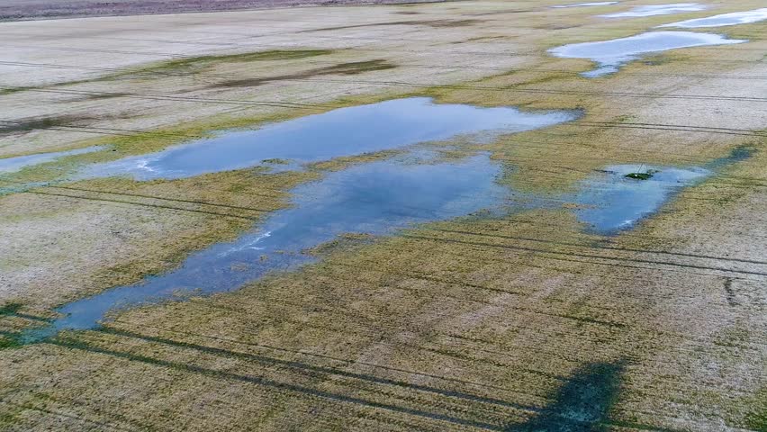 aerial view of flooded fields and lakes at spring