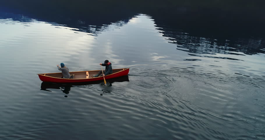 People Canoe on Lake Drone 4K