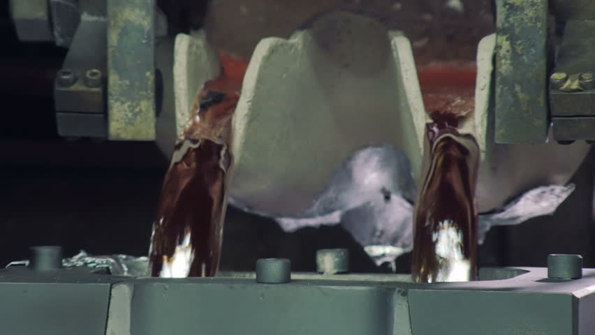 close-up of making engine, molten aluminium is casting in form of car engine in car factory Royalty-Free Stock Footage #26418026