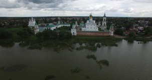Aerial drone video of Rostov in the afternoon, Spaso-Yakovlevski Monastery area, located on shore of Nero Lake  in Yaroslavl Oblast in north-eastern Russia 200 km away from Moscow