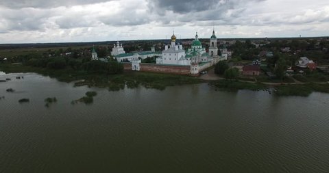 Aerial drone video of Rostov in the afternoon, Spaso-Yakovlevski Monastery area, located on shore of Nero Lake  in Yaroslavl Oblast in north-eastern Russia 200 km away from Moscow