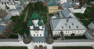 Aerial drone video of complex of ancient churches in Rostov area, located on shore of Nero Lake in center of Rostov in Yaroslavl Oblast in north-eastern Russia 200 km north of Moscow