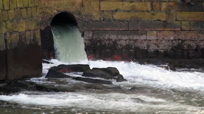 Drain Water - Sewage Pipe Discharging Into The Sea