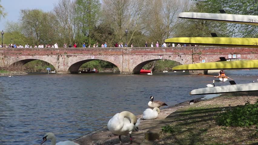 Stratford Upon Avon Foot Bridge over river with boats and people