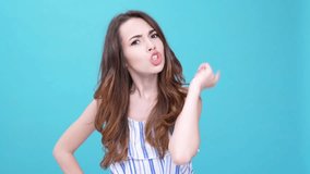 Serious brunette young woman scolding and refusing isolated
