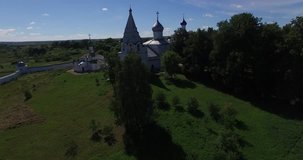 Aerial drone video of Svyato-Troicki Danilov Monastery in Yaroslavl Oblast area in the afternoon, located in ancient town of Pereslavl 150 km north-east of Moscow, the capital of Russia