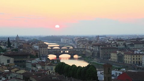 Time lapse shot of a city, Ponte Vecchio, Arno River, Florence, Tuscany, Italy