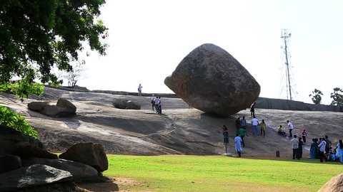 TAMIL NADU, INDIA - JUNE 2012: Locked-on shot of a boulder, Krishnas Butter Ball, Mahabalipuram, Kancheepuram District, Tamil Nadu, India