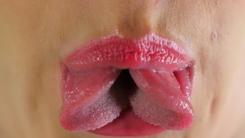 tongue splitting, bodymification. a girl with a split tongue