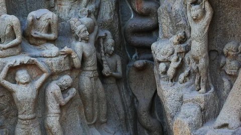 TAMIL NADU, INDIA - JUNE 2012: Tilt up shot of rock sculptures, Pancha Rathas, Mahabalipuram, Kancheepuram District, Tamil Nadu, India