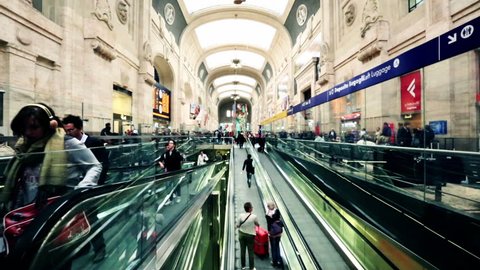 MILAN, ITALY - MAY 2012: Time lapse shot of passengers at an railroad station, Milan, Lombardy, Mediterranean Sea, Italy