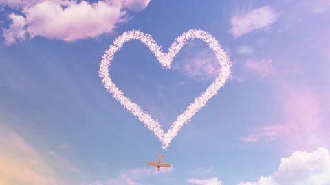 Love is in the air. A heart drawn in the sky by an aeroplane 