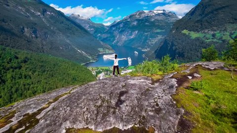 Geiranger fjord, Beautiful Nature Norway panorama. It is a 15-kilometre (9.3 mi) long branch off of the Sunnylvsfjorden, which is a branch off of the Storfjorden (Great Fjord).