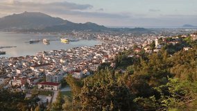 Aerial view of Zakynthos (Zante) town. Colorful spring sunrise on the Ionian Sea. Beautiful cityscape of Greece city. Traveling concept background. Full HD video (High Definition).