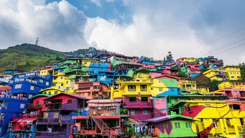 La Trinidad, Philippines - May 02, 2017: Time lapse view of the colorful Stobosa houses in La Trinidad, Benguet, Philippines. Zoom out.