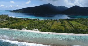 French Polynesia Tahiti aerial view of island Huahine and Motu Murimaora, coral reef lagoon and Pacific Ocean. Tropical paradise.