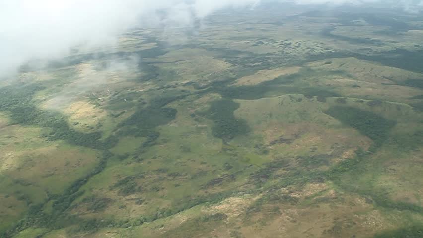 Aerial view of ladscape in Venezuela through clouds