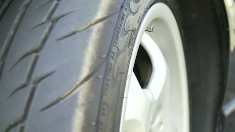 Closeup video shot of a car wheel on a car