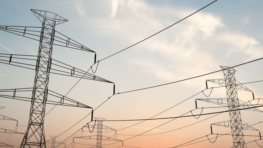 Electricity pylons. Moving along two row of pylons. electric high voltage pylon against beautiful sky. energy efficiency conception. loopable animation Royalty-Free Stock Footage #26543081