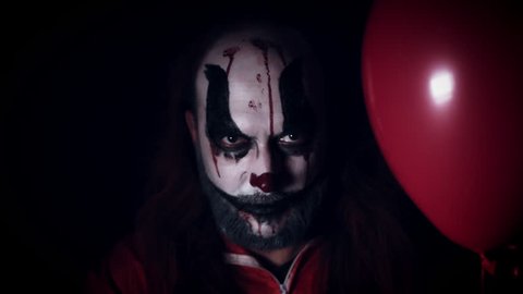 4k Halloween Horror Clown Man with Balloon