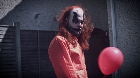 4k Halloween Horror Clown Man with Balloon