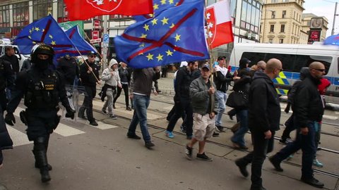 BRNO, CZECH REPUBLIC, MAY 1, 2017: March of radical extremists, suppression of democracy, against the government of the Czech Republic, European Union, against refugees, police, flags, Europe, EU