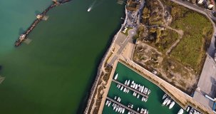 Aerial shot of small port in the winter sunset in Pisa Tuscany Italy, 4K
