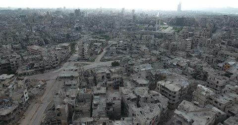A flight of a drone over the city of Homs in Syria 