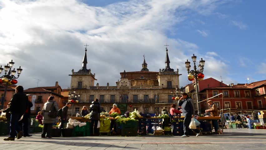 LEON, SPAIN - CIRCA MAY 2012: Time lapse of people buying fruits and vegetables