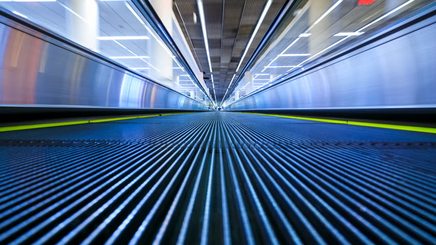 4K Motion blur timelapse of moving escalator in the airport 