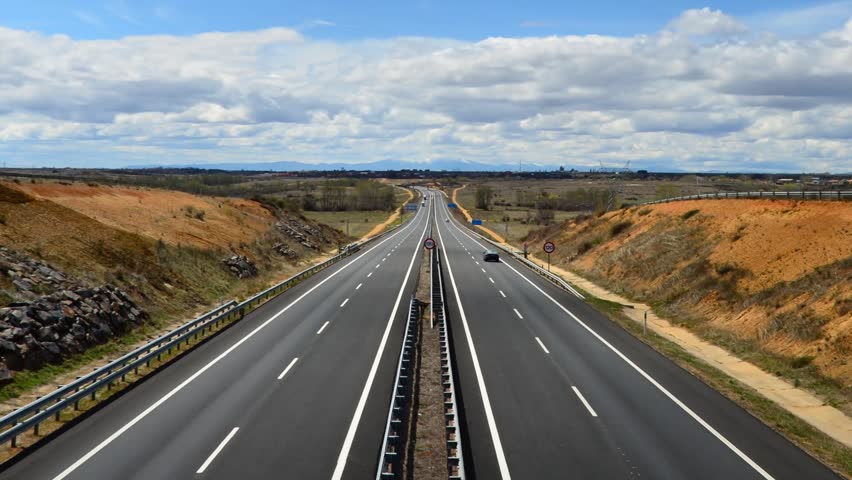 LEON, SPAIN - CIRCA MAY 2012: Time lapse of cars driving along AP-71 Highway