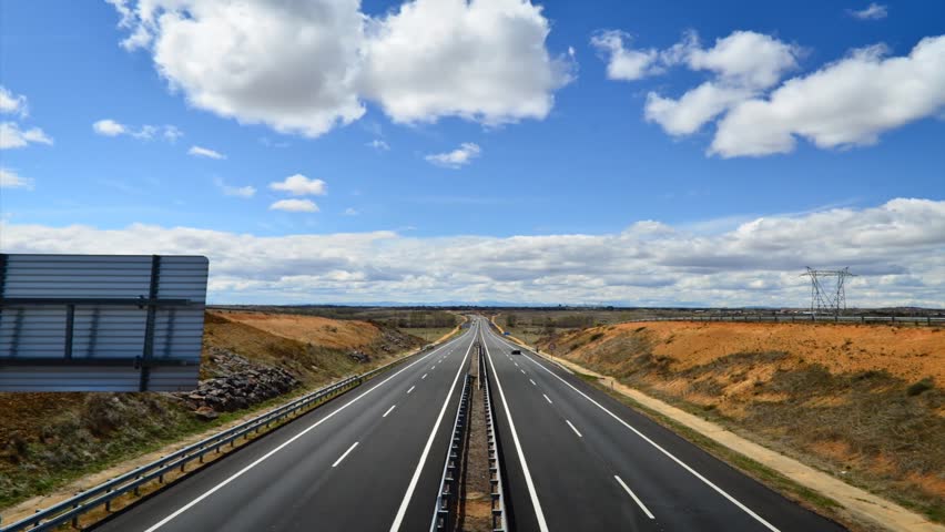 LEON, SPAIN - CIRCA MAY 2012: Time lapse of cars driving along AP-71 Highway