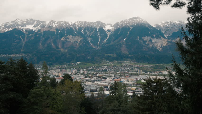 Innsbruck city with Alps mountains view at spring. Tyrol, Austria.