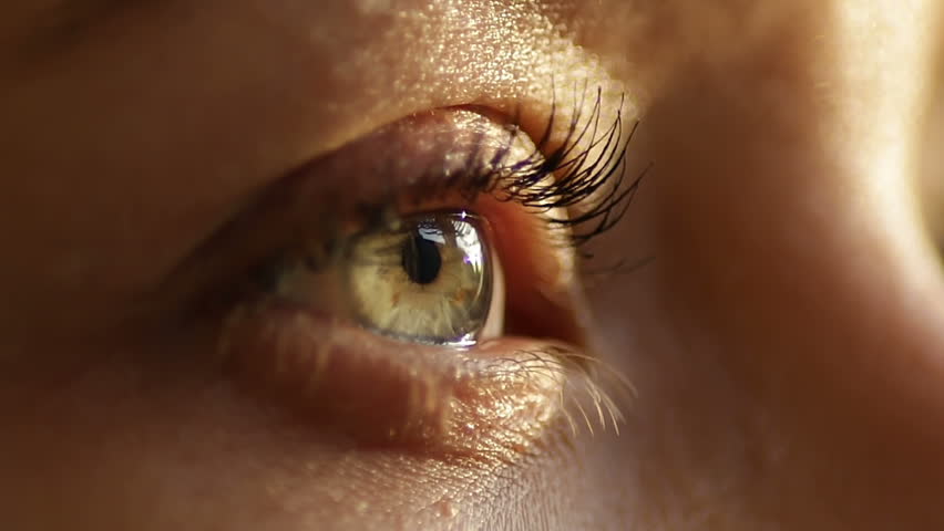 The girl's eye in the sunlight is looking around. Slow motion. | Shutterstock HD Video #26603213