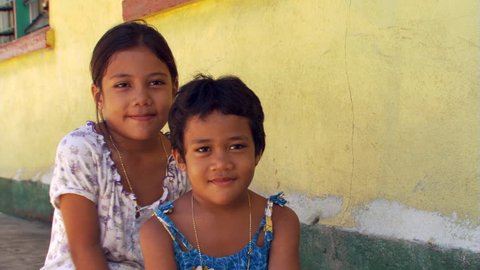 Smiling Samoan Sisters Sitting Portrait Front Stock Footage Video (100% ...