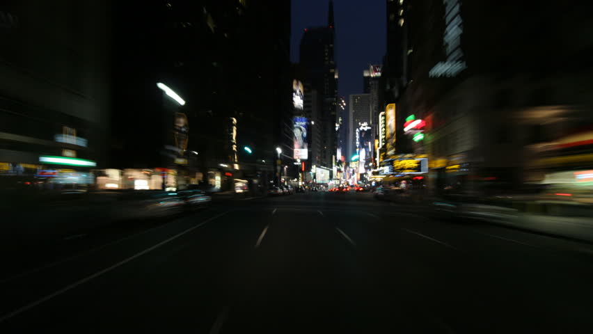 High-speed driver's POV of West 42nd Street in NYC at night Royalty-Free Stock Footage #26627764