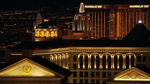 Flying over casino rooftops in Las Vegas at night. Shot in 2005.