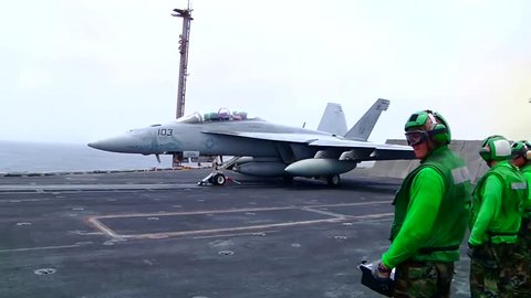 f 18 launch from aircraft carrier