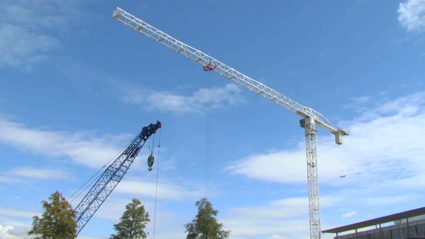 Cranes on a construction site of a commercial development.