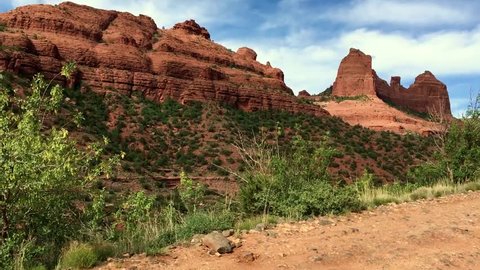 Scenic bumpy ride along the Schnebly Hill rocky road with the beautiful red rock landscape of Sedona in Arizona.
