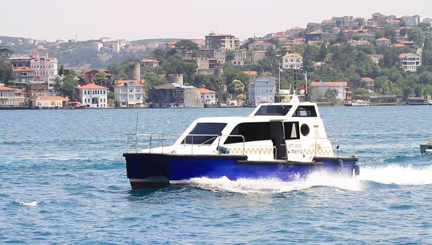 ISTANBUL - JULY 5: A Sea Taxi boat sails in Bosporus on July 5, 2012 in