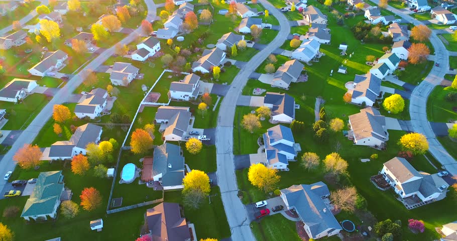 Exceptionally beautiful neighborhoods, nice homes, aerial view at sunrise.
