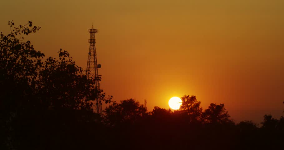 Beautiful sunset behind communication tower in India